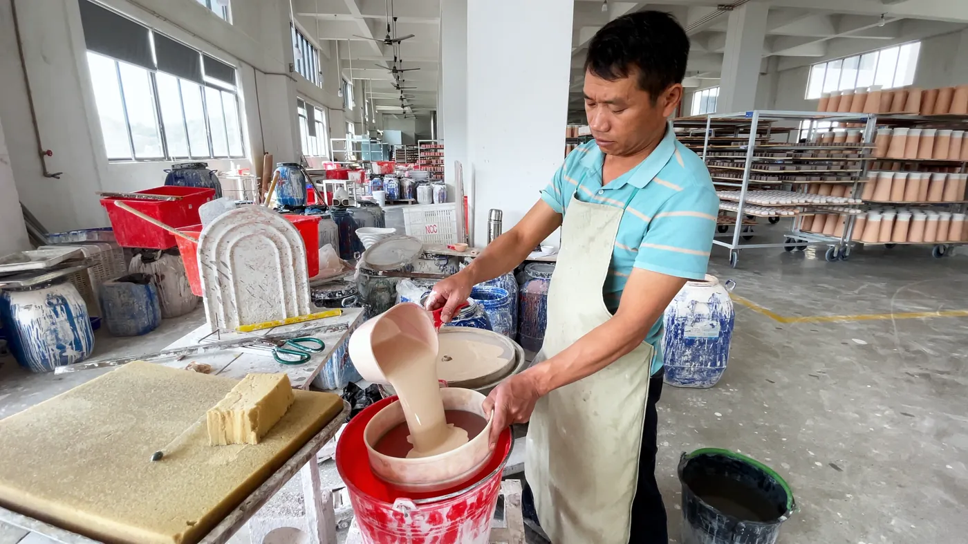 Pouring glaze out of a piece