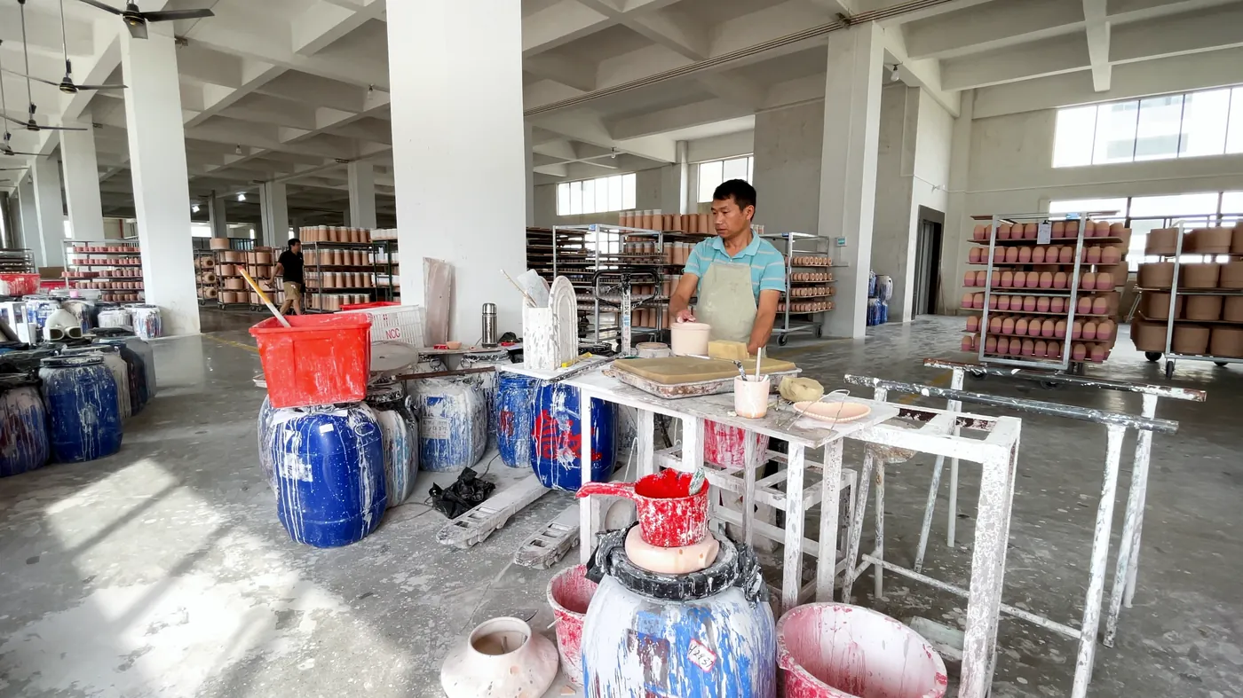 The glazing hall with glaze drums
