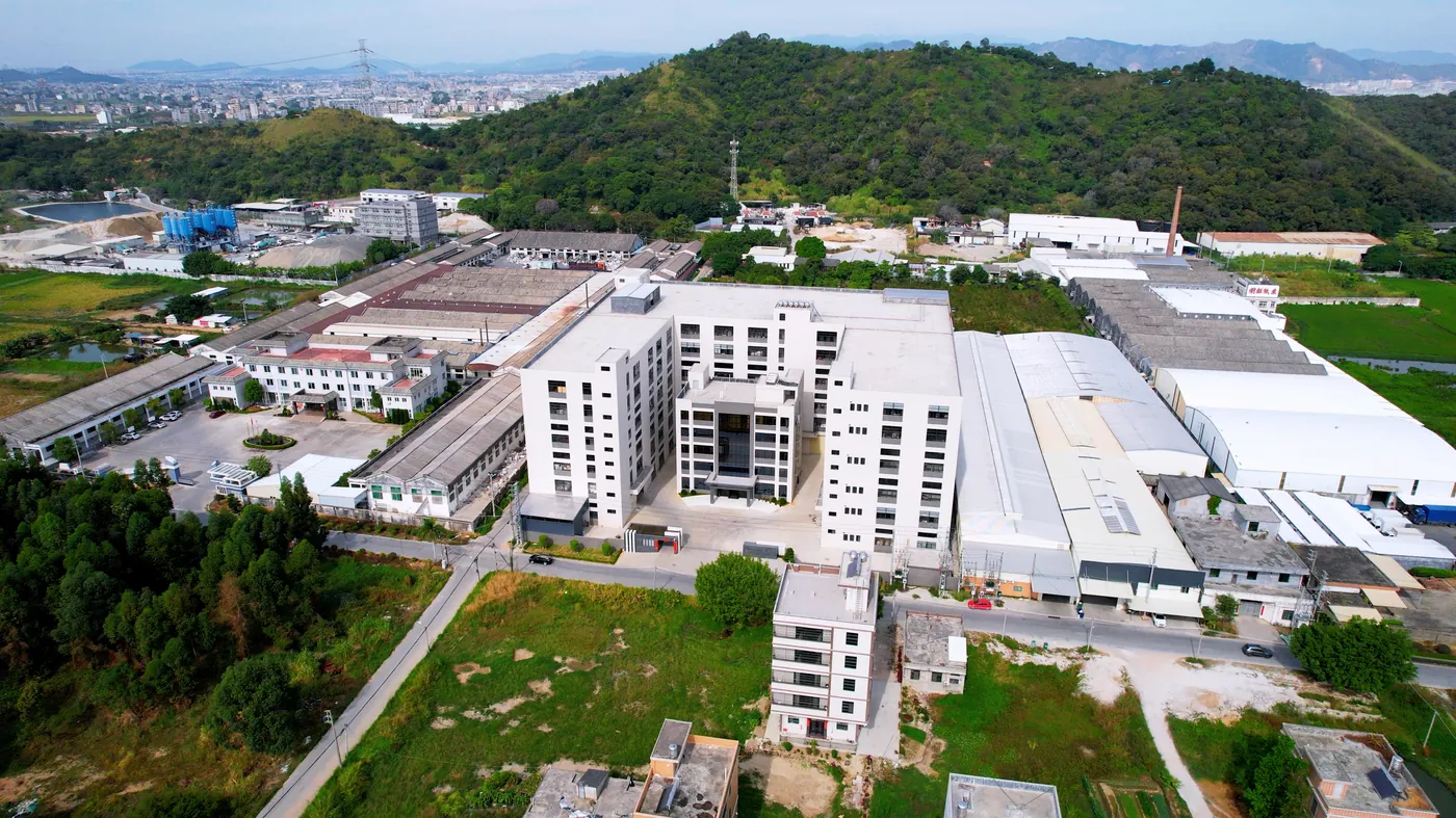 Aerial view of the factory with hills behind