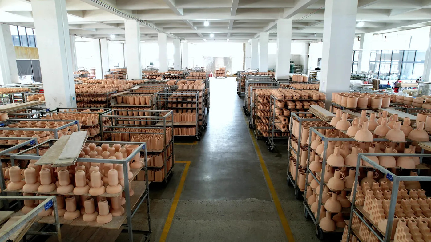Kiln cars loaded with bisque ware