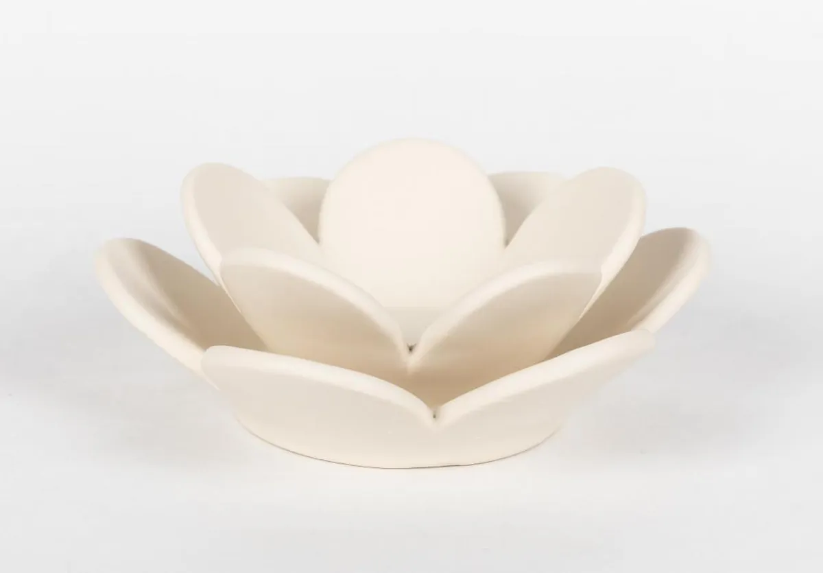 Bisque bowl with layered lotus petals, before glazing