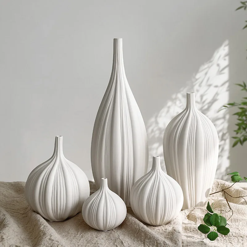 Fluted white bottle vases